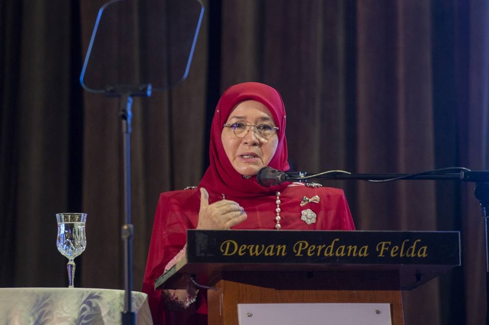 Raja Permaisuri Agong Tunku Azizah Aminah Maimunah Iskandariah delivers her speech during the 60th Women's Day celebration in Kuala Lumpur August 25, 2022. — Picture by Shafwan Zaidon