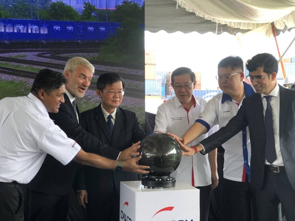 Penang chief minister Chow Kon Yeow (third from left) and CMA CGM managing director Ravindra Sahu (far right) at the official opening ceremony of the new depot and new block train service today. — Picture by Opalyn Mok
