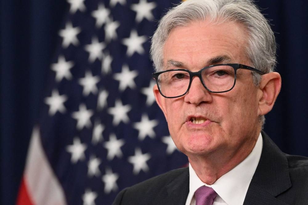 In this file photo taken on July 27, 2022 Federal Reserve Board Chairman Jerome Powell speaks during a news conference in Washington, DC. - With US inflation at a 40-year high, economists say there is no doubt about the Federal Reserve's policy course: Interest rates will continue to rise. — AFP pic