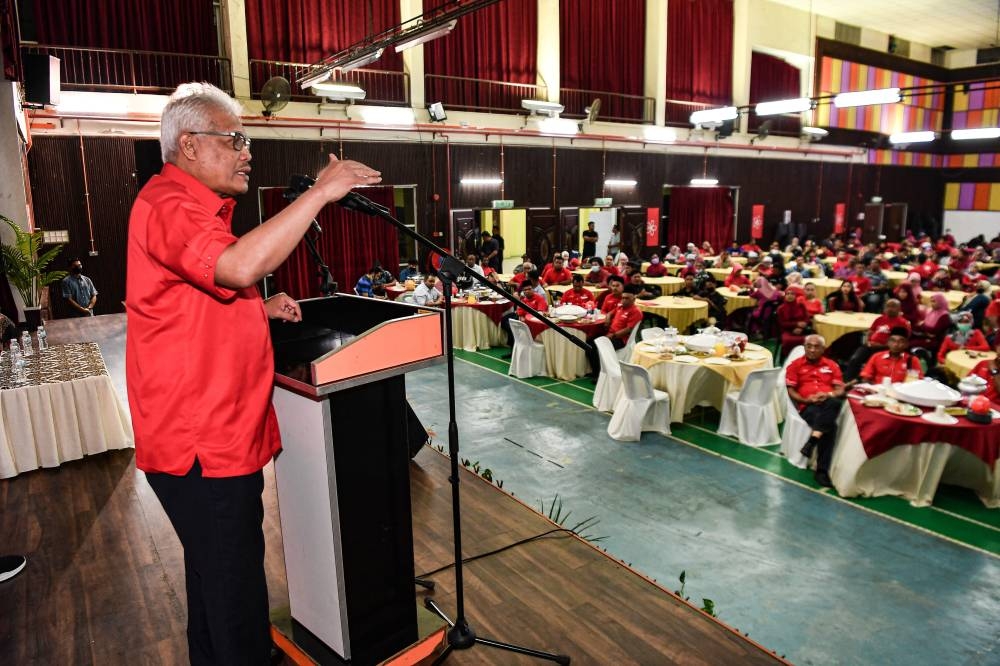 Home Minister Datuk Seri Hamzah Zainudin, who is also the Party Bersatu secretary-general and Larut Member of Parliament at the opening of the Larut Bersatu Division meeting in Perak, August 26, 2022. — Bernama pic 