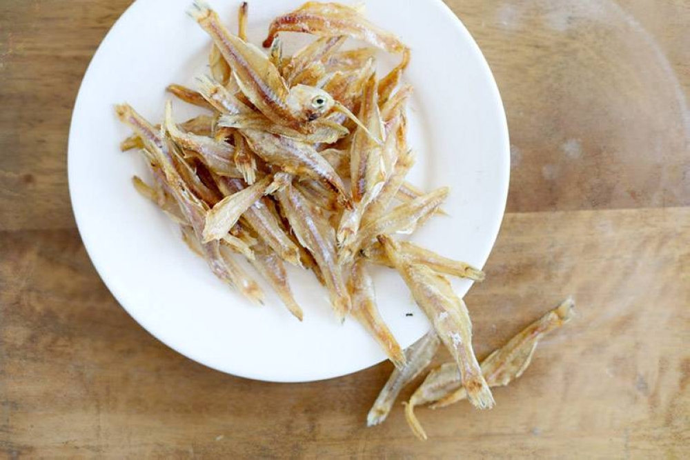 Instead of chicken or vegetable broth, use stock made from 'ikan bilis' for extra umami.