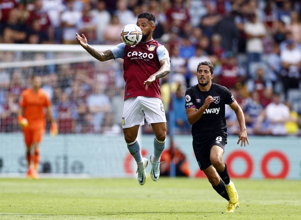 Aston Villa's Douglas Luiz in action with West Ham United's Pablo Fornals during the Aston Villa v West Ham United match at Villa Park, Birmingham, Britain August 28, 2022 — Action Images via Reuters/Andrew Boyers