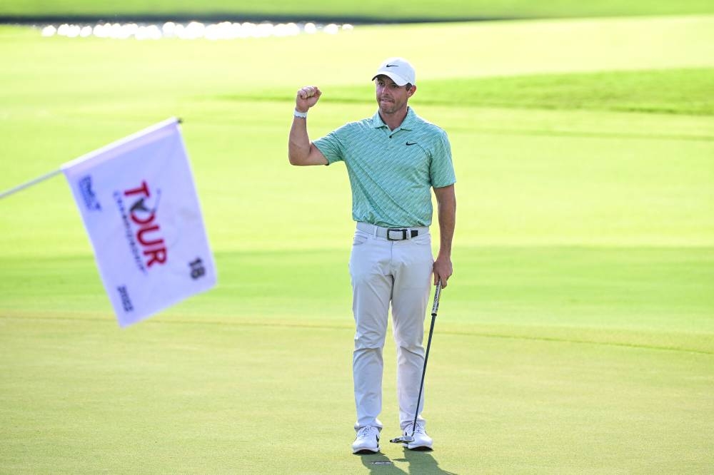 Rory McIlroy celebrates on the 18th green after making a putt to win the Tour Championship golf tournament in Atlanta August 28, 2022. — Reuters pic