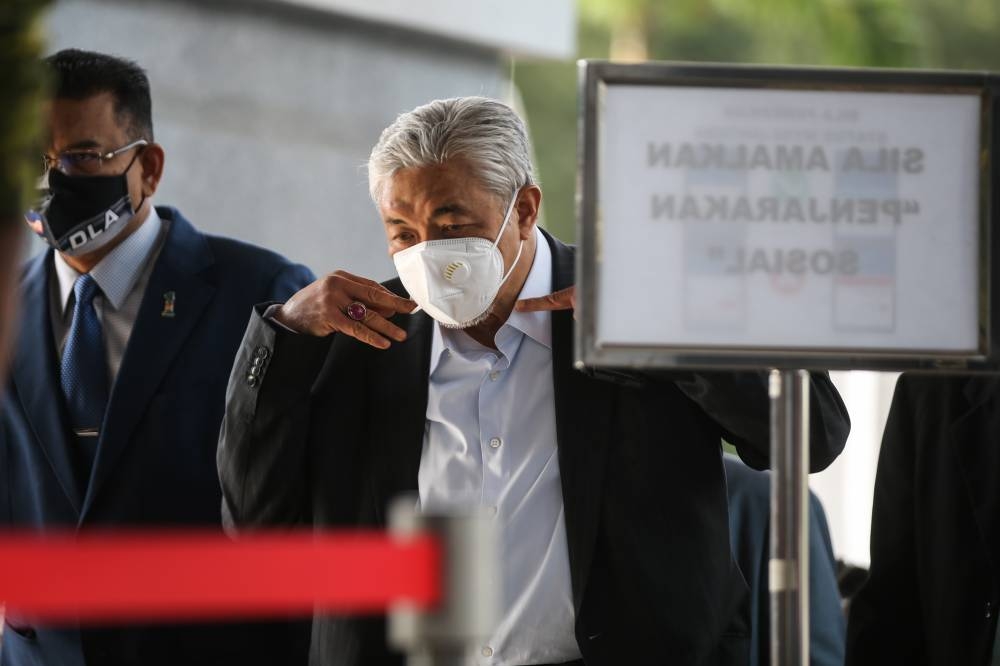 Datuk Seri Ahmad Zahid Hamidi arrives at Kuala Lumpur High Court August 29, 2022. — Picture by Ahmad Zamzahuri