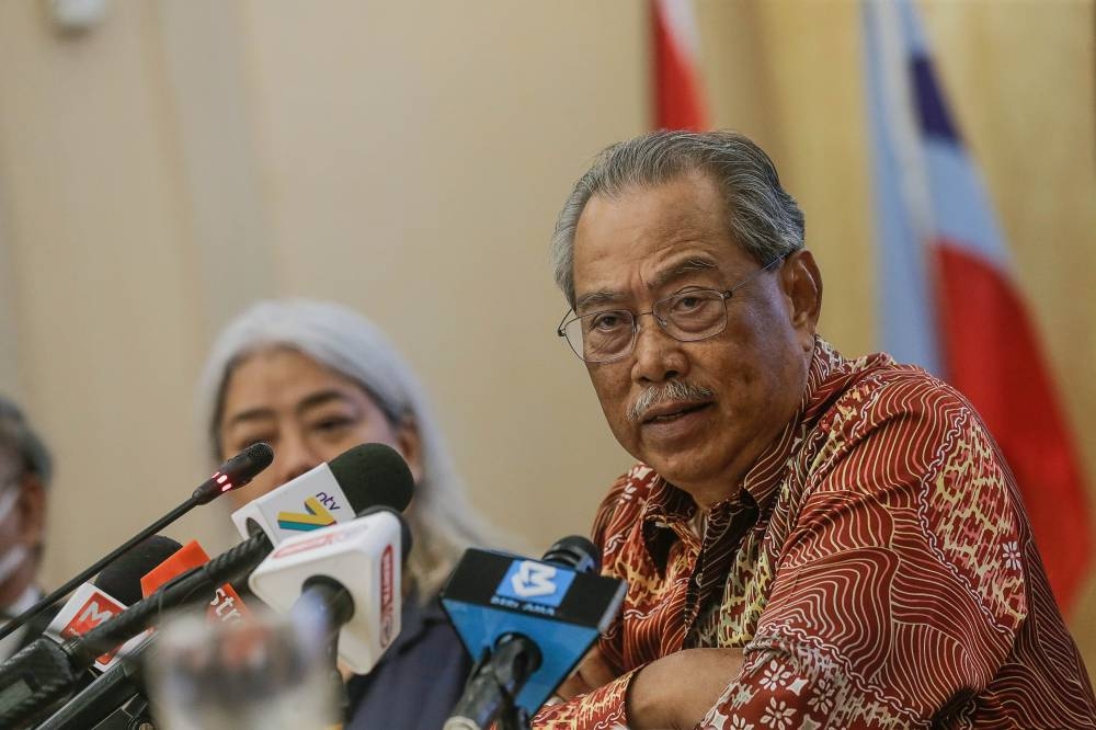 National Recovery Council Chairman Tan Sri Muhyiddin Yassin speaks to the press after chairing the National Recovery Council meeting at the Ministry of Finance in Putrajaya August 29, 2022. — Picture by Sayuti Zainudin
