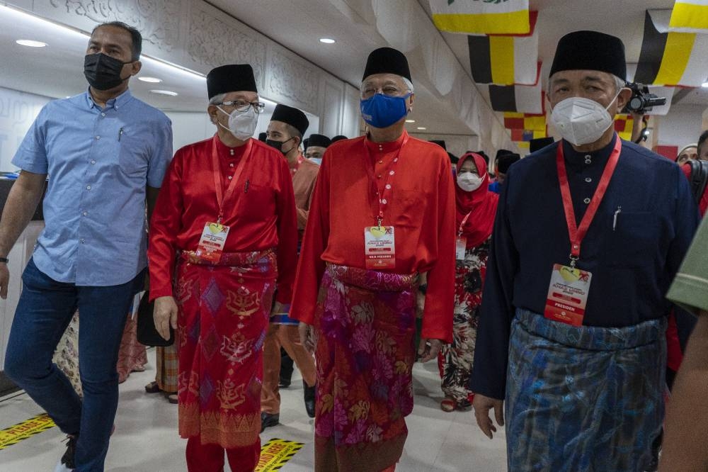Umno vice president Datuk Seri Ismail Sabri (second from left) arrives at a special assembly in Kuala Lumpur May 15, 2022. — Picture by Shafwan Zaidon