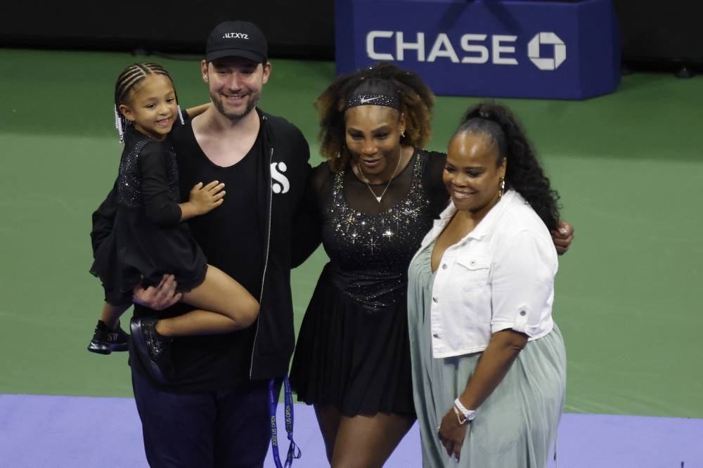 Serena Williams poses for a picture with daughter Olympia, husband Alexis Ohanian and sister Isha Price after a ceremony honouring her career at the USTA Billie Jean King National Tennis Centre in New York August 29, 2022. — Reuters pic