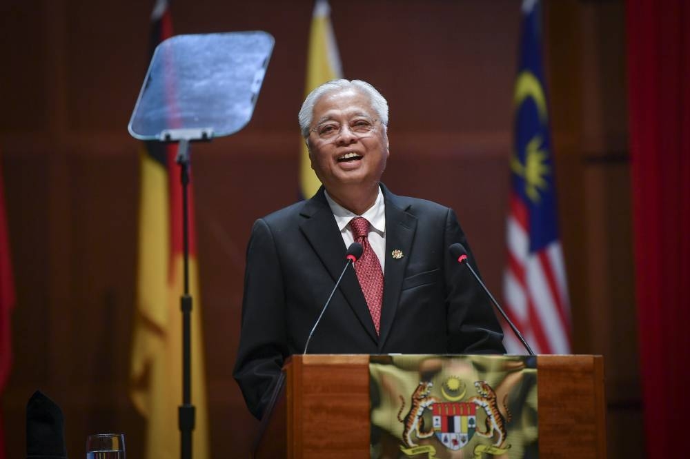 Datuk Seri Ismail Sabri Yaakob delivers a speech at the Putrajaya International Convention Centre August 30, 2022. — Bernama pic