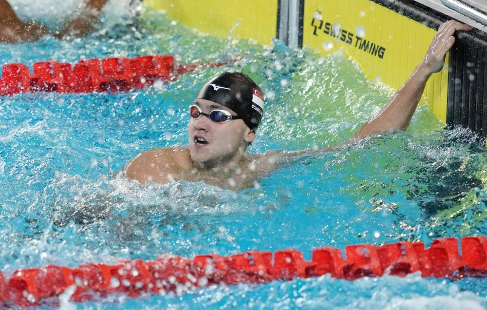 Joseph Schooling celebrates after winning the men's 100m butterfly event at the SEA Games in Hanoi on May 16, 2022. — SportsSG