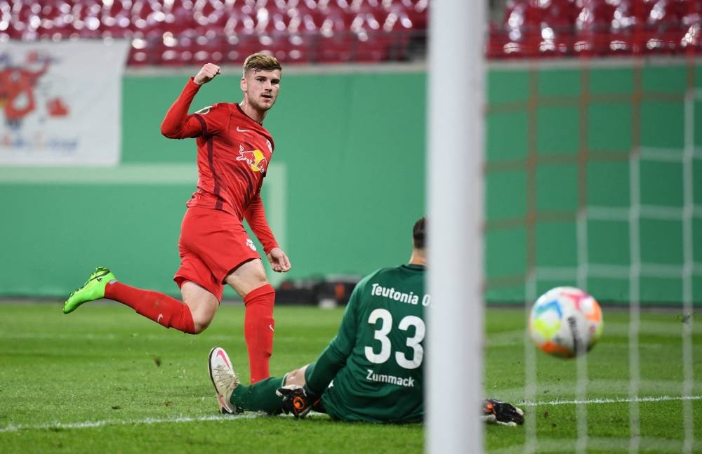 RB Leipzig's Timo Werner scores their first goal against Teutonia 05 Ottensen at the Paul Greifzu Stadium in Dessau-Rosslau August 30, 2022. — Reuters pic