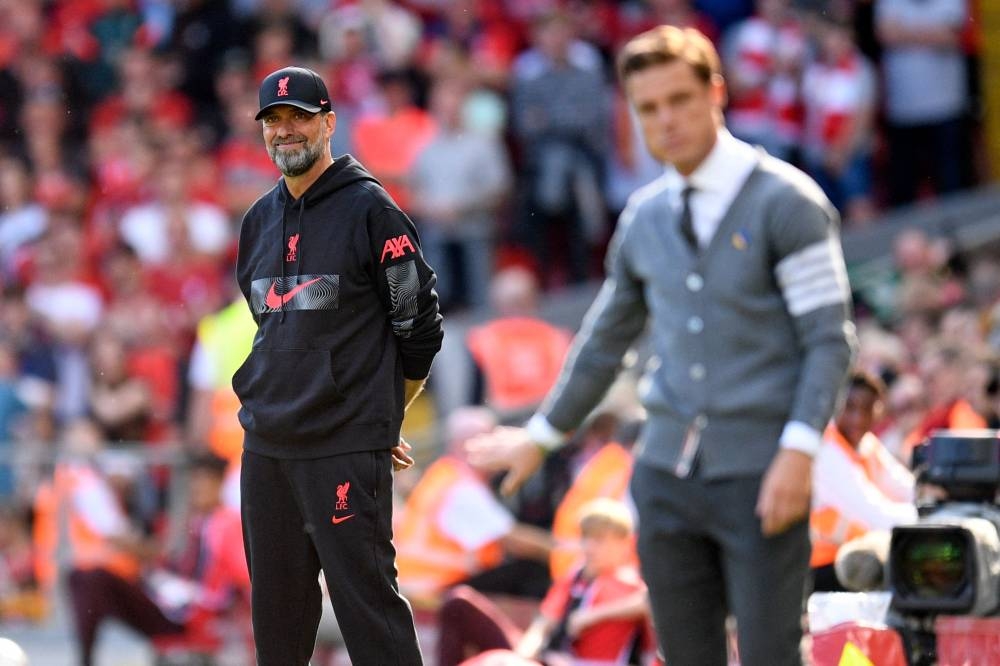 Liverpool manager Jurgen Klopp and Bournemouth head coach Scott Parker (right) look on during the English Premier League match between Liverpool and Bournemouth at Anfield in Liverpool, August 27, 2022. — AFP pic 