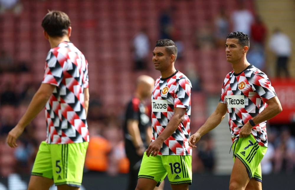 Manchester United’s Cristiano Ronaldo and Casemiro during the warm up before the match against Southampton at St Mary’s Stadium, Southampton, August 27, 2022. — Reuters pic 