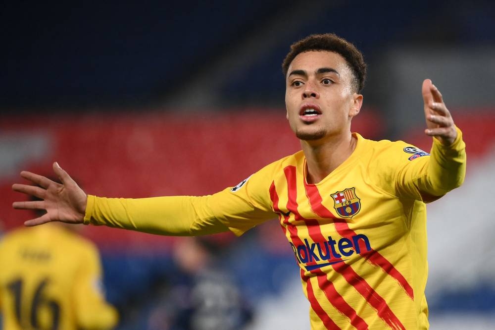 Barcelona's Sergino Dest reacts during the Uefa Champions League clash against Paris Saint-Germain at the Parc des Princes stadium in Paris March 10, 2021. — AFP pic