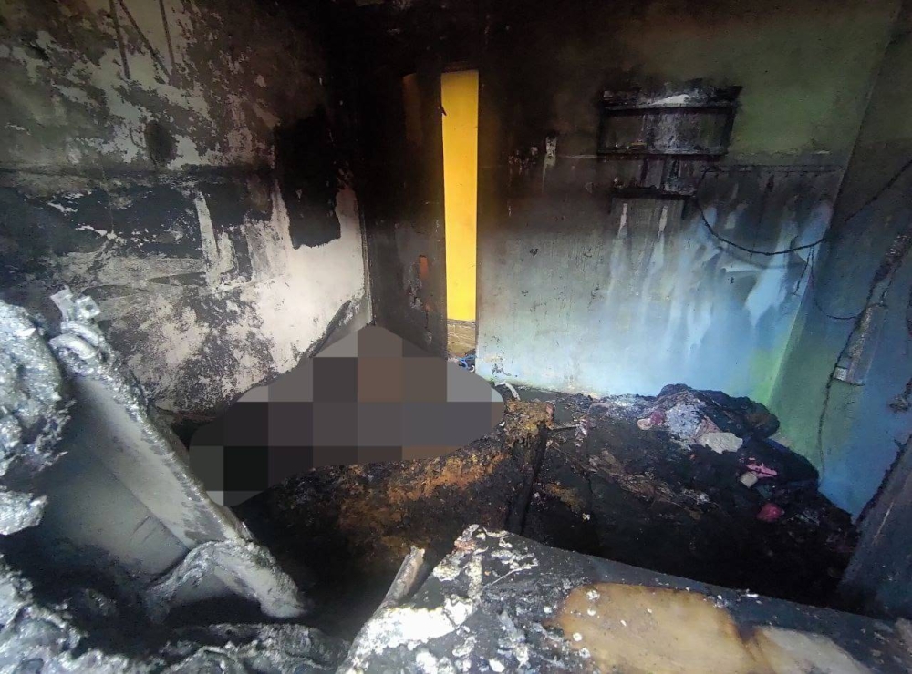 The fire-damaged bedroom of the house in Kampung Datuk where two children died in an afternoon fire today, Sept 3, 2022. — Picture courtesy of the Johor Fire and Rescue Department
