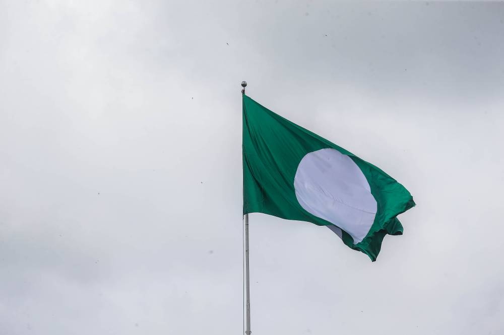 The PAS flag is pictured fluttering above the  Kedah PAS Complex during the 68th Annual PAS Congress (Muktamar PAS) in Kota Sarang Semut, September 3, 2022. — Picture by Sayuti Zainudin