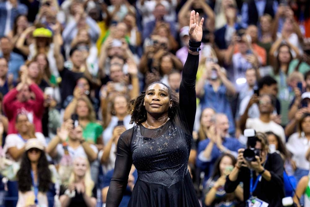 Serena Williams waves to the audience after losing against Australia’s Ajla Tomljanovic during their 2022 US Open Tennis tournament women's singles third round match at the USTA Billie Jean King National Tennis Center in New York, on September 3, 2022. — AFP pic