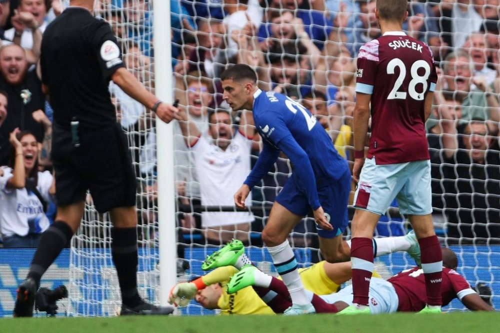 Chelsea's German midfielder Kai Havertz (centre) celebrates after scoring his team second goal during the English Premier League match between Chelsea and West Ham United at Stamford Bridge in London, September 3, 2022. — AFP pic