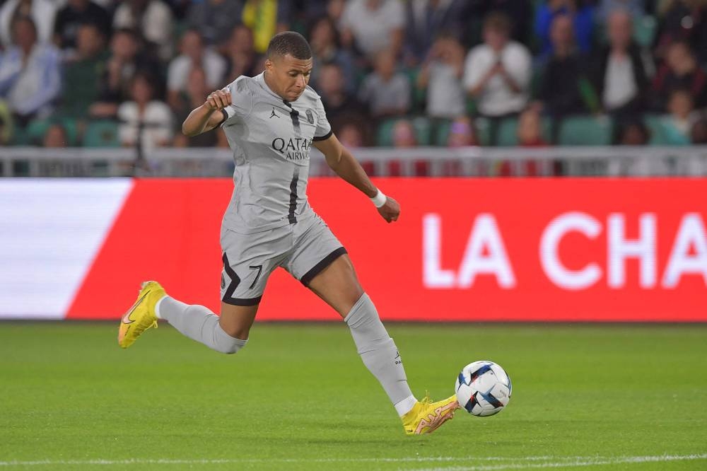 Paris Saint-Germain's French forward Kylian Mbappe runs with the ball  during the French L1 match between FC Nantes and Paris Saint-Germain (PSG) at the Stade de la Beaujoire Louis Fonteneau in Nantes, western France, on September 3, 2022. — AFP pic
