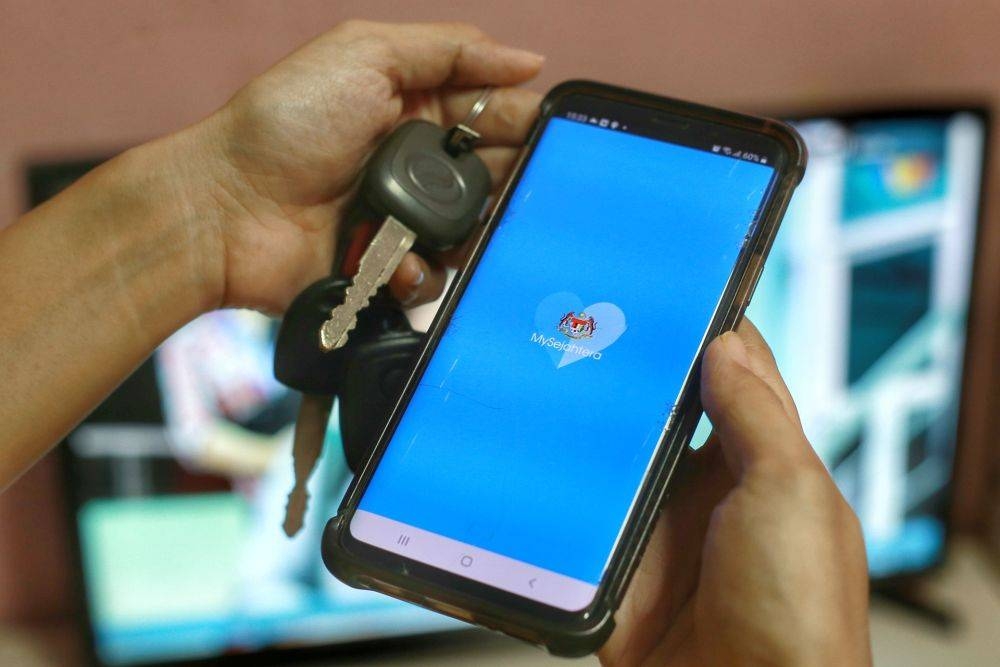 The MySejahtera app is pictured on a smartphone in this file picture taken on June 7, 2020. — Picture by Ahmad Zamzahuri