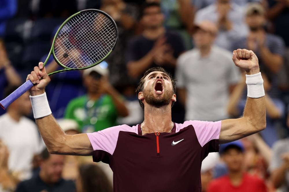 Karen Khachanov of Russia celebrates match point against Pablo Carreٌo Busta of Spain on September 4, 2022 in New York City. — Julian Finney/Getty Images/AFP pic