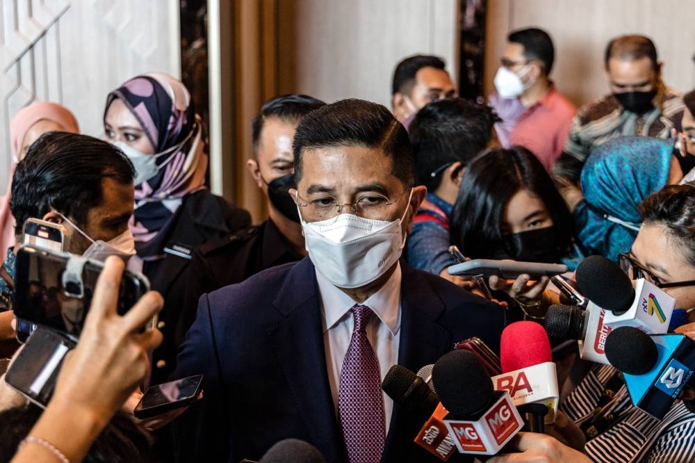 Senior Minister of International Trade and Industry Datuk Seri Mohamed Azmin Ali speaks during a press conference at Hilton Kuala Lumpur August 11, 2022. — Picture by Firdaus Latif  