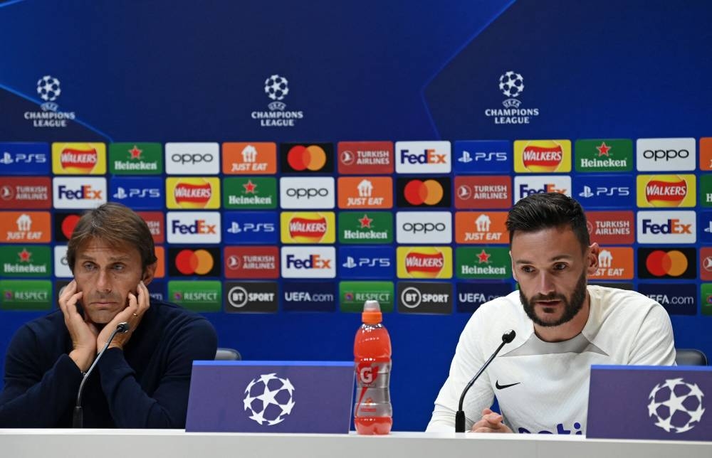 Tottenham Hotspur head coach Antonio Conte and goalkeeper Hugo Lloris attend a press conference at the Tottenham Hotspur Football Club Training Ground, in north London September 6, 2022. — AFP pic 