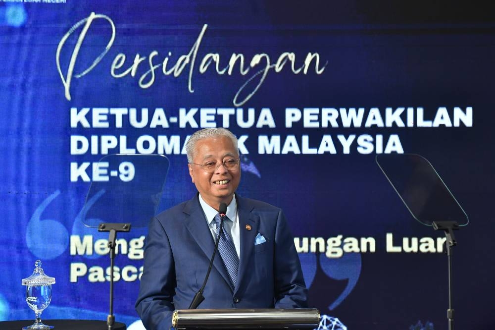 Prime Minister Datuk Seri Ismail Sabri Yaakob delivers a speech at the 9th Malaysian Heads of Diplomatic Mission, Wisma Putra, Putrajaya, September 6, 2022. — Bernama pic 
