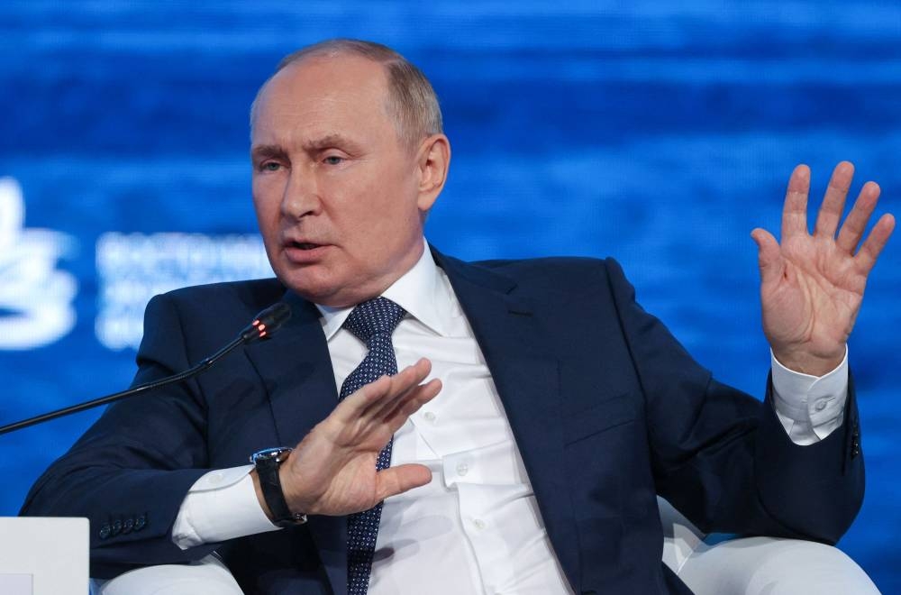 Russian President Vladimir Putin gestures during the plenary session of the 2022 Eastern Economic Forum (EEF) in Vladivostok, Russia September 7, 2022. — Sergey Bobylev/TASS Host Photo Agency handout pic via Reuters