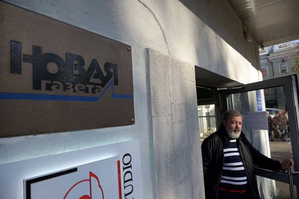In this file photo taken on October 07, 2021 Novaya Gazeta editor Dmitry Muratov is seen at the entrance to the office of the Novaya Gazeta newspaper in Moscow. — AFP pic