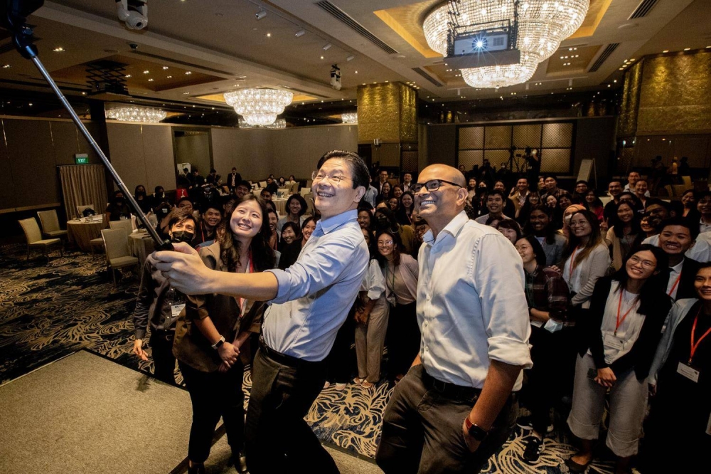 (Front row, from left) Dr Teo Kay Key, Deputy Prime Minister Lawrence Wong and Dr Janil Puthucheary with participants at a dialogue organised by the Institute of Policy Studies on September 7, 2022. ― TODAY pic