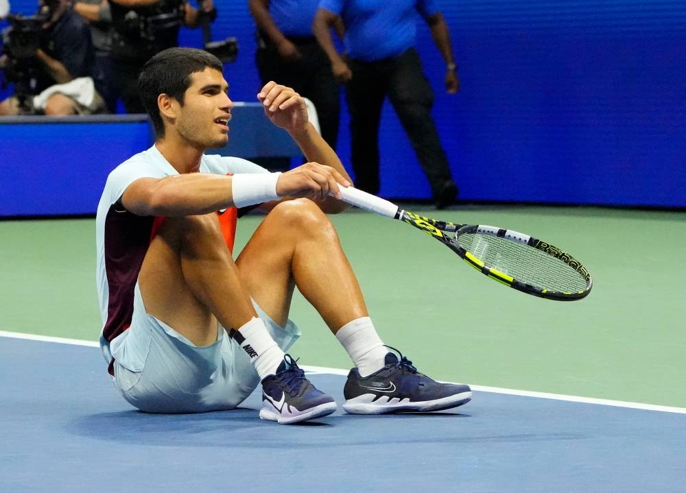 Carlos Alcaraz reacts after beating Jannik Sinner at the USTA Billie Jean King National Tennis Center in New York September 7, 2022. — Reuters pic