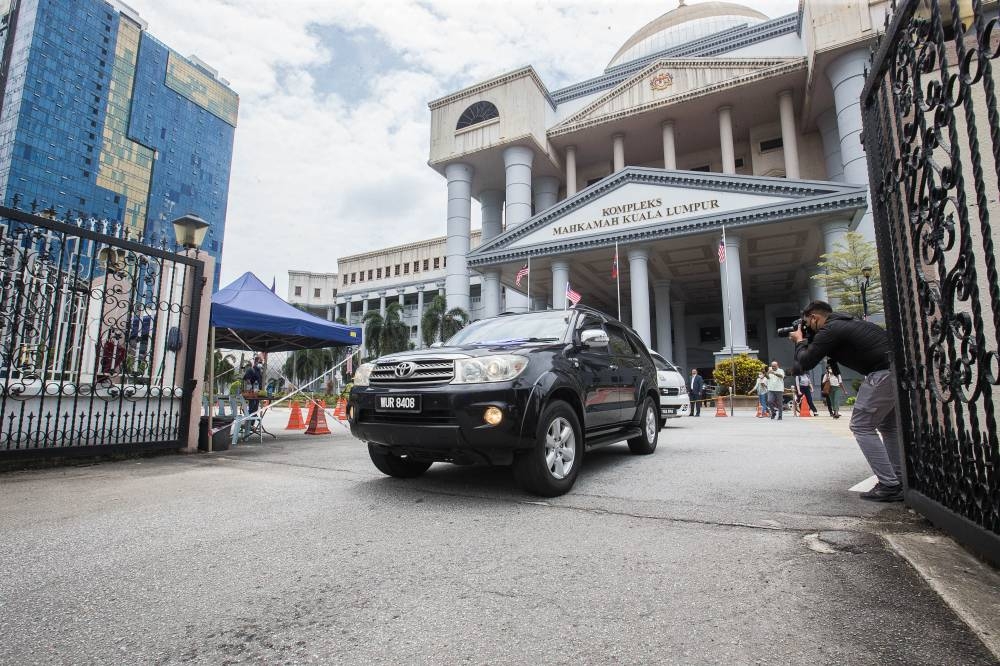 A vehicle carrying former Datuk Seri Najib Razak seen leaving the court compound after his 1MDB case at Kuala Lumpur High Court, September 8, 2022. — Picture by Sayuti Zainudin