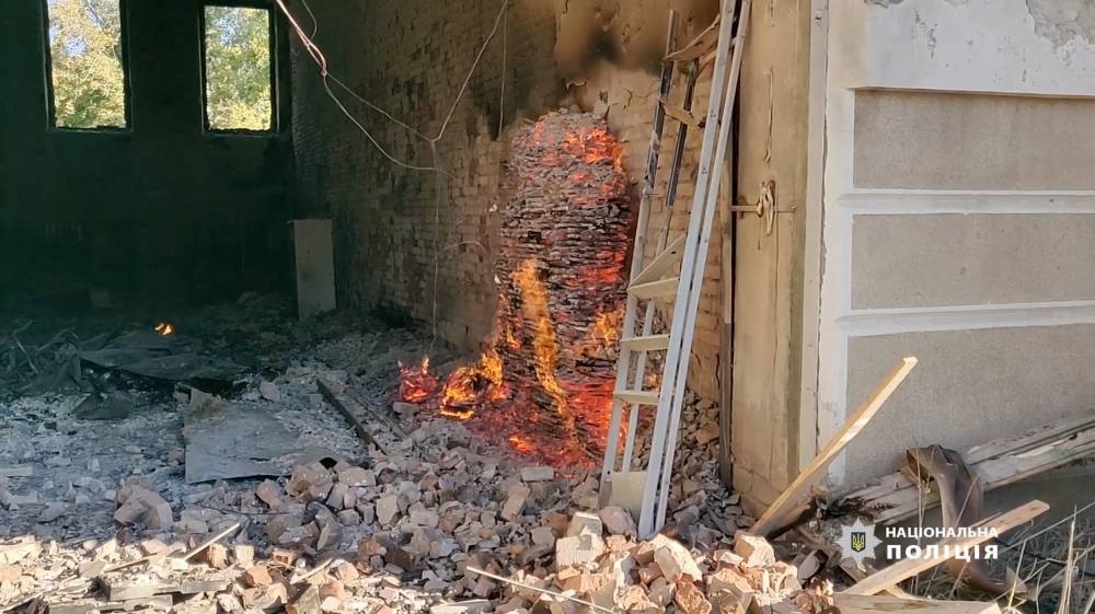 Parts of Martynov Palace of Culture burn after it was shelled, amid Russia's attack on Ukraine, in Bakhmut, Donetsk region, September 8, 2022 in this still image obtained from handout video. ― Donetsk Regional Police/Handout via Reuters