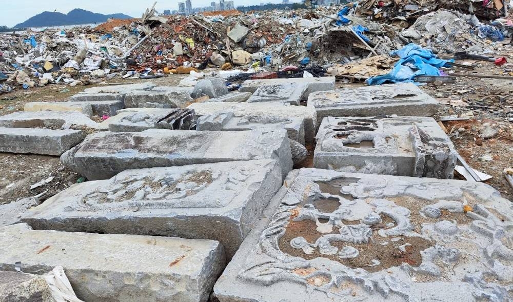 Photos of the tombstone rubble found at the dump site were posted on Facebook by Penang-based environmental and heritage conservationist Khoo Salma. — Picture via Facebook 