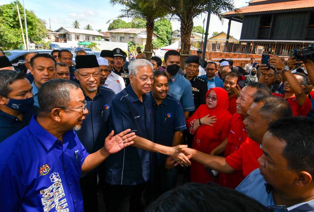 Prime Minister Datuk Seri Ismail Sabri Yaakob greets members of the public at Masjid Kampung Laut, Tumpat September 9, 2022. — Bernama pic