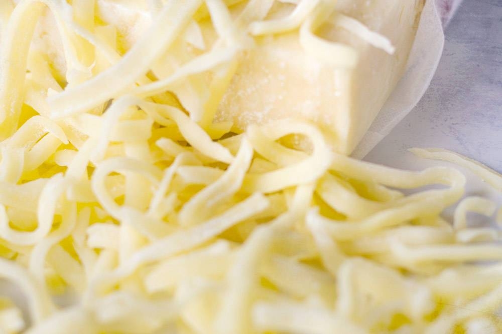 Typically Pecorino Romano is used for 'cacio e pepe' but any hard, salty cheese such as Parmesan will do.