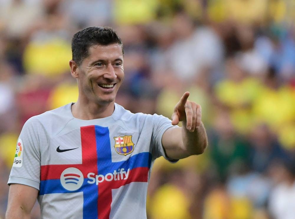 Barcelona's Polish forward Robert Lewandowski celebrates after scoring his team's second goal during the Spanish league football match between Cadiz CF and FC Barcelona at the Nuevo Mirandilla stadium in Cadiz, on September 10, 2022. — AFP pic