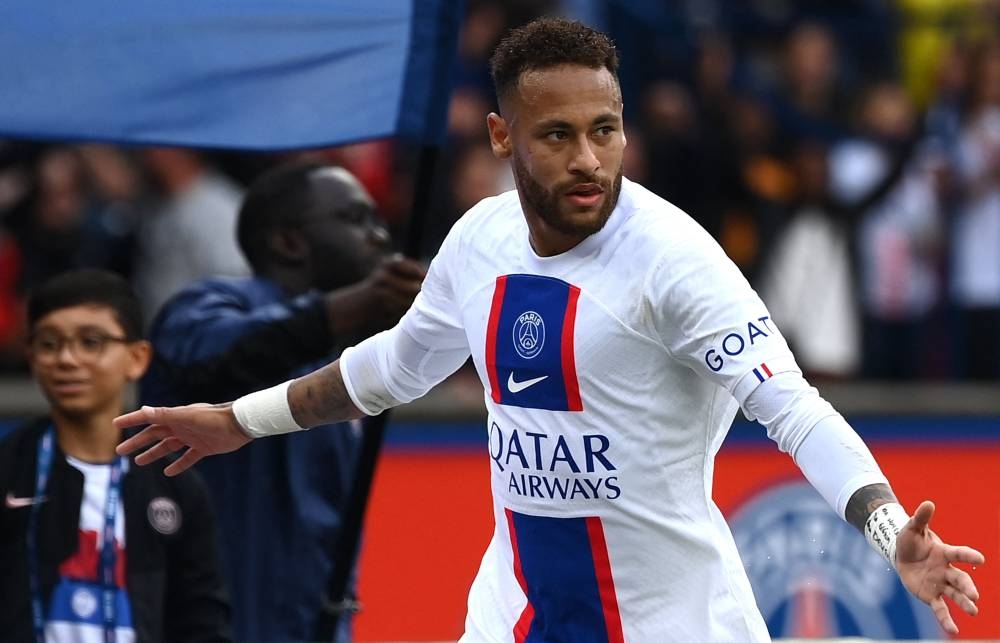 Paris Saint-Germain's Brazilian forward Neymar celebrates after scoring the 1-0 goal during the French L1 football match between Paris Saint-Germain (PSG) and Stade Brestois 29 (Brest) at the Parc des Princes Stadium in Paris on September 10, 2022. — AFP pic