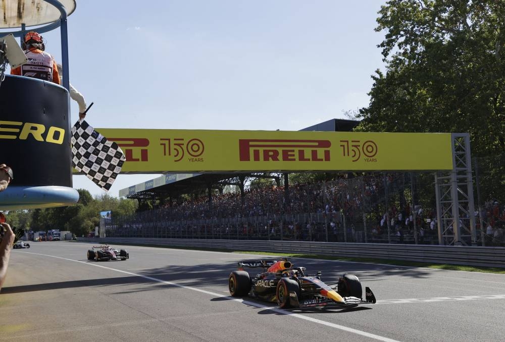 Red Bull's Max Verstappen crosses the finish line to win the Italian Grand Prix at Autodromo Nazionale Monza September 11, 2022. — Reuters pic