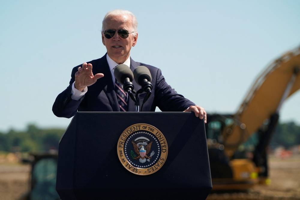 US President Joe Biden speaks on rebuilding American manufacturing through the Chips and Science Act at the groundbreaking of the new Intel semiconductor manufacturing facility in New Albany, Ohio September 9, 2022. — Reuters pic