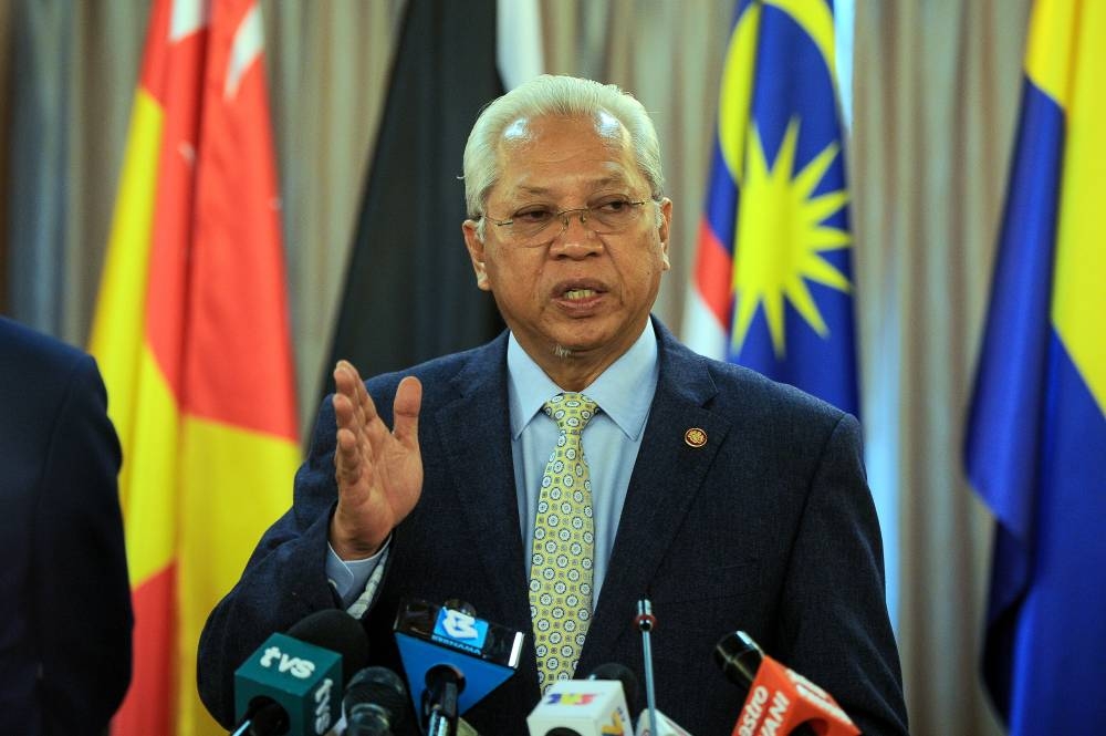 Tan Sri Annuar Musa speaks at a press conference after chairing the Special Task Force on Jihad Against Inflation meeting in Putrajaya, September 12, 2022. — Bernama pic    