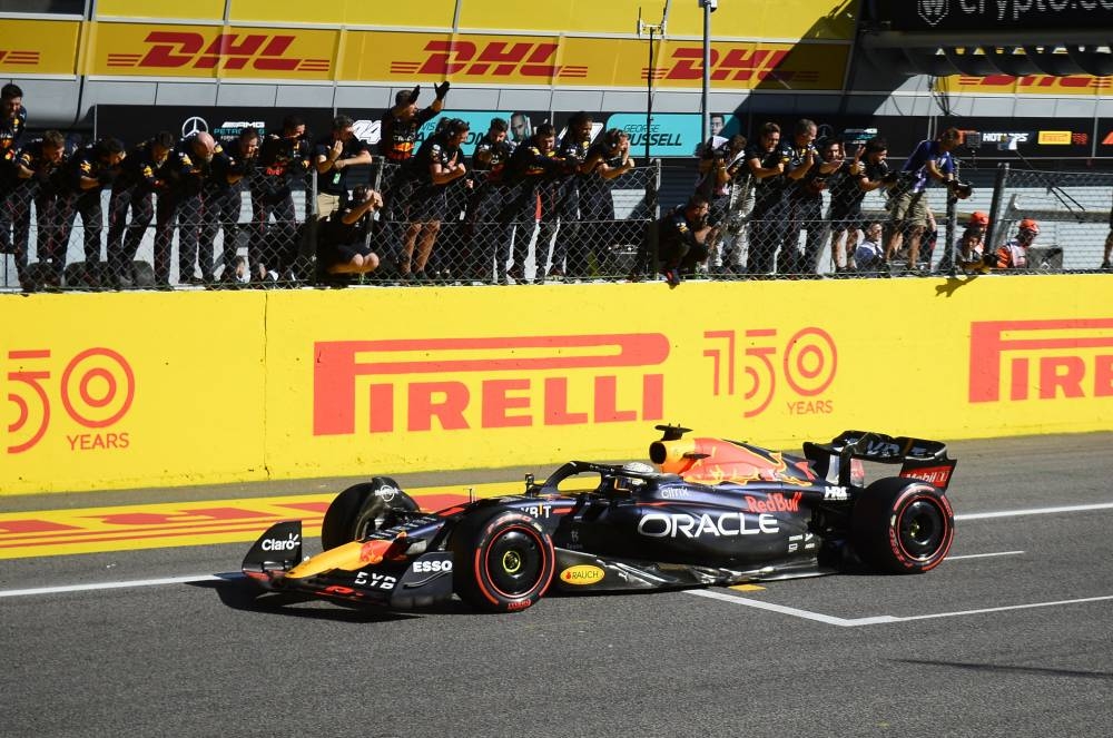 Red Bull’s Max Verstappen drives past his team after winning the Italian Grand Prix at the Autodromo Nazionale Monza, Monza, Italy, September 11, 2022. — Reuters pic 