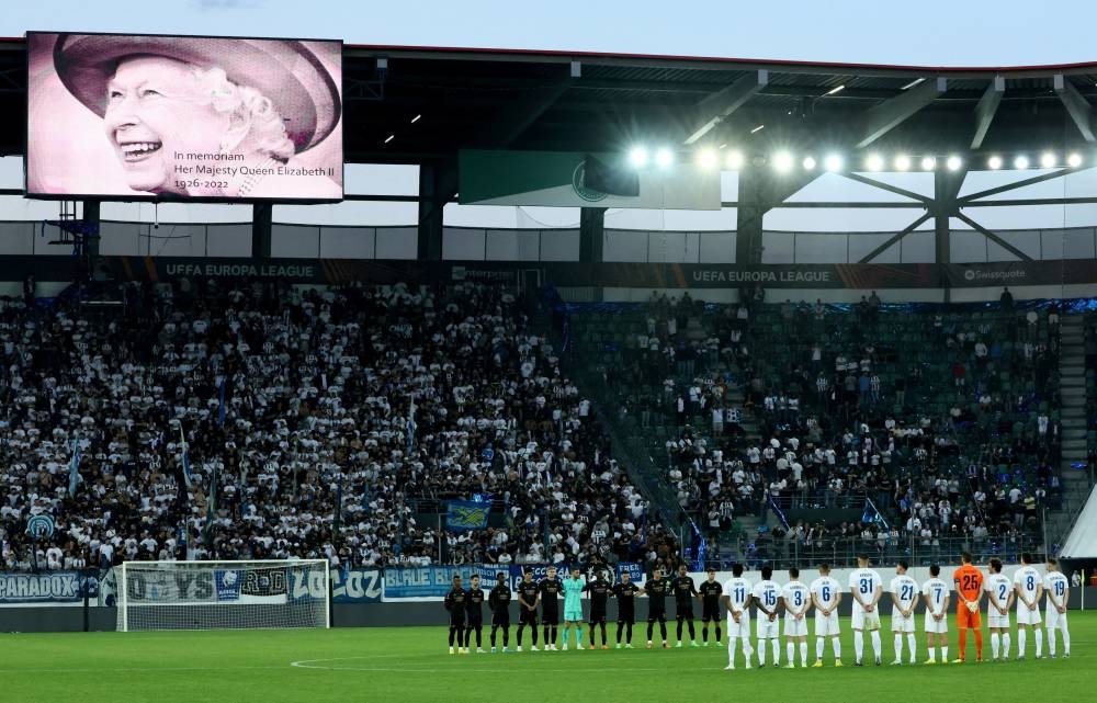 Players during a minutes silence before the start of the second half of FC Zurich v Arsenal, after the death of Britain’s Queen Elizabeth,  Arena St Gallen, St Gallen, Switzerland, September 8, 2022. — Reuters pic 