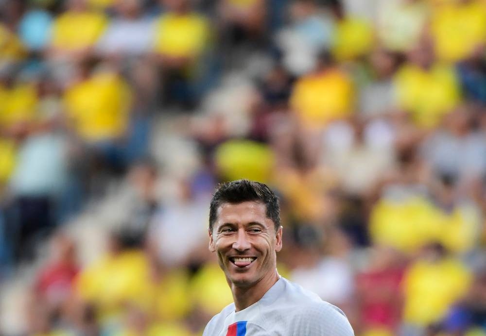 Barcelona forward Robert Lewandowski celebrates after scoring his team’s second goal during the Spanish league match between Cadiz CF and FC Barcelona at the Nuevo Mirandilla stadium in Cadiz, September 10, 2022. — AFP pic 