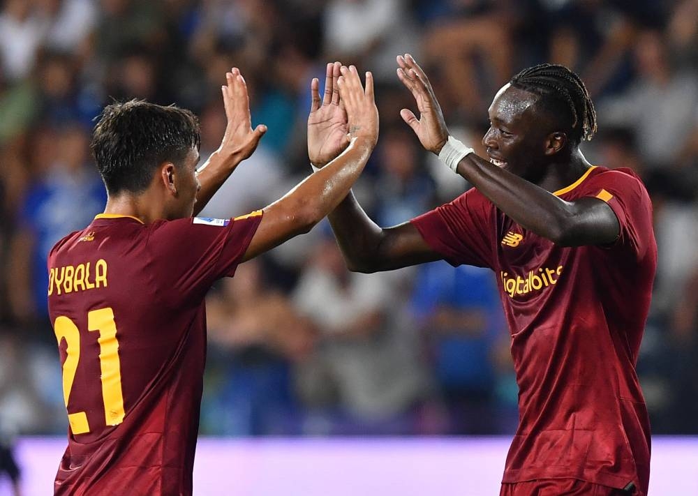 Roma's Tammy Abraham celebrates scoring their second goal against Empoli with Paulo Dybala at Stadio Carlo Castellani, Empoli September 12, 2022. — Reuters pic