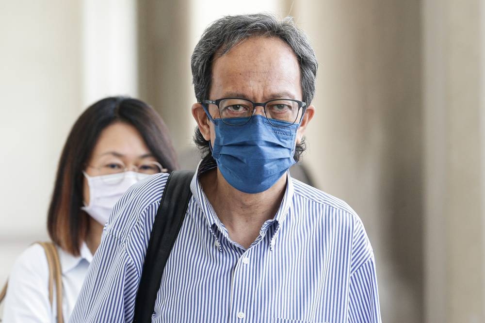 Azam Aris, former editor-in-chief of The Edge, is pictured at the Petaling Jaya Magistrate's Court September 13, 2022. — Picture by Sayuti Zainudin 