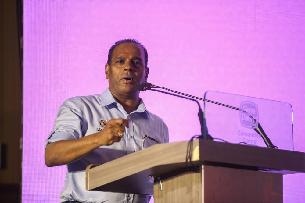Human Resources Minister Datuk Seri M. Saravanan delivers a speech at the Sime Darby Convention Centre August 11, 2022. — Picture by Ahmad Zamzahuri