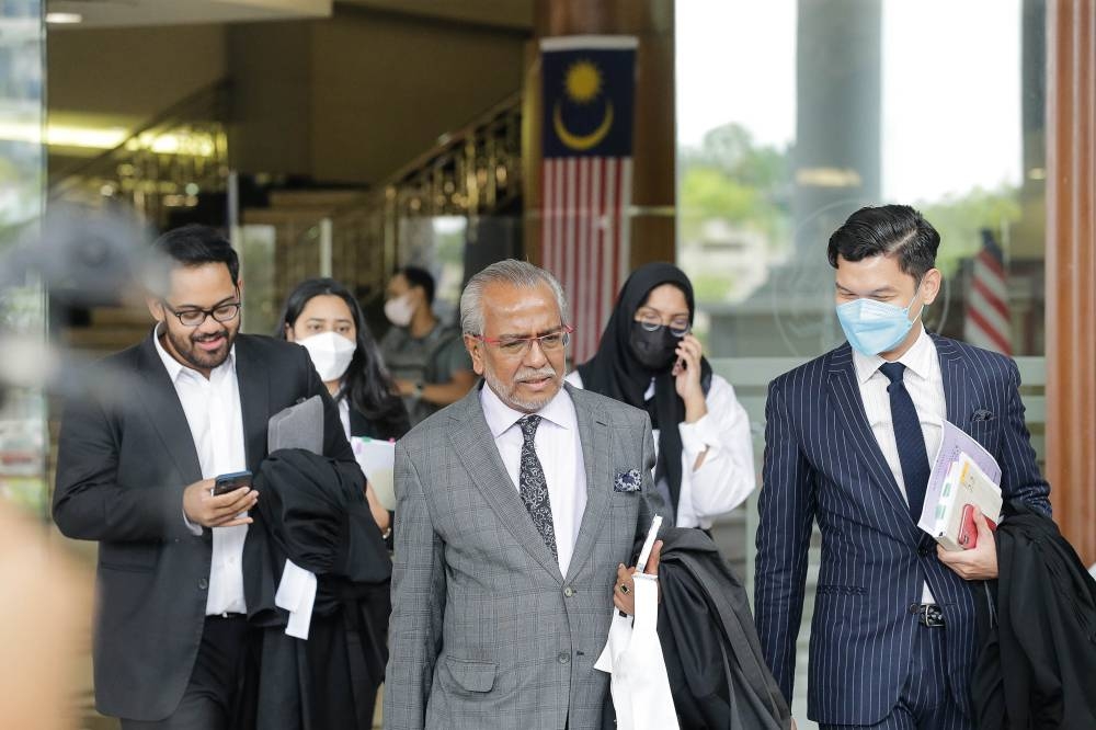 Tan Sri Muhammad Shafee Abdullah (centre) is pictured at the Kuala Lumpur Court Complex September 14, 2022. — Picture by Sayuti Zainudin
