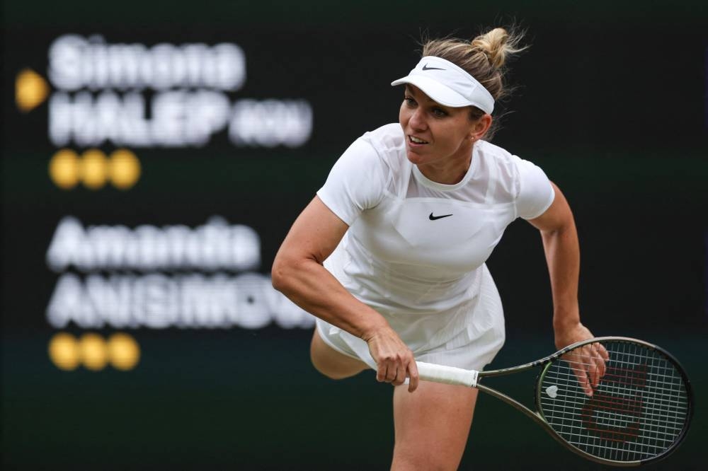 Romania’s Simona Halep won the French Open in 2018 and Wimbledon in 2019, but slipped out of the top 20 in May and then lost in the second round at Roland Garros. — AFP pic