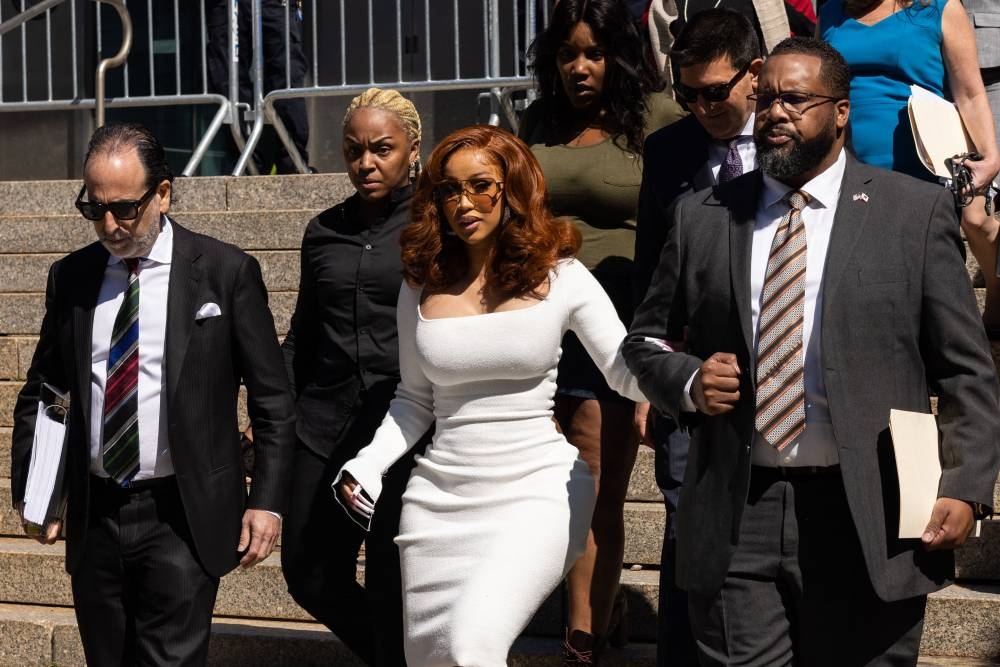 US rapper and songwriter Cardi B departs Queens County Criminal Court in New York on September 15, 2022. Cardi B appeared in court for a hearing regarding charges of assaulting two strippers. — AFP pic